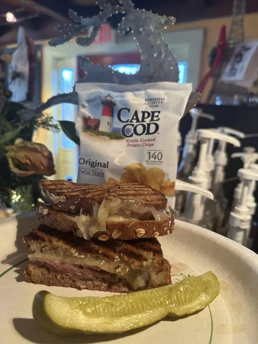 Stacked grilled cheese sandwich with melted cheese